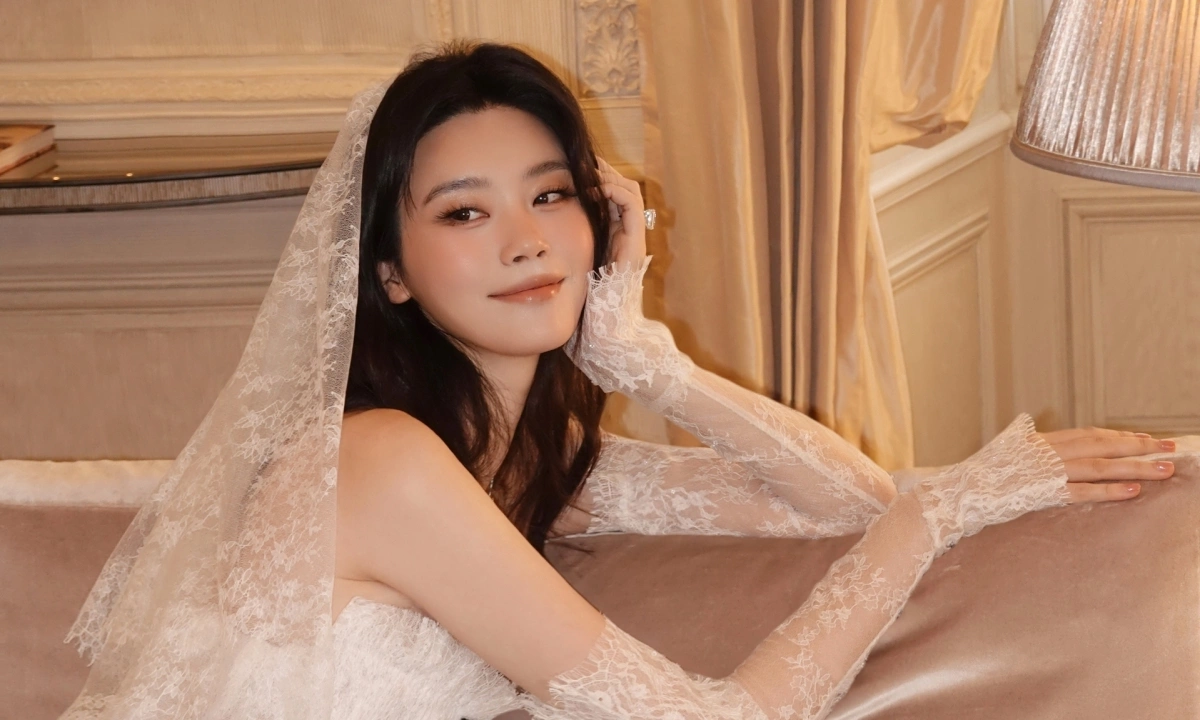 RR88 đổi thưởng: Hề Mộng Dao rạng rỡ trong váy cưới thiết kế Việt - hình ảnh - winrr88.com